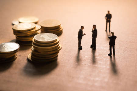 Concept of business negotiation. Businessmen talking about money.の写真素材