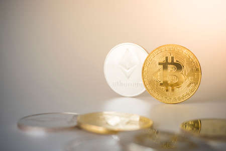 Golden Bitcoin and Silver Etherium coin Cryptocurrency.
