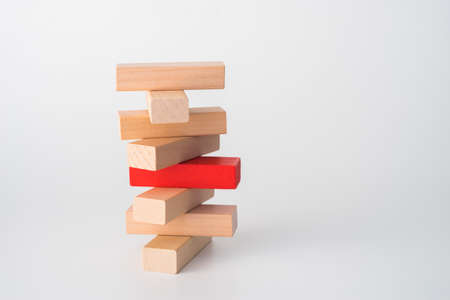 Wood block unstable staking. Business risk concept metaphor.の写真素材