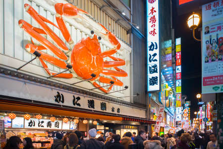 Osaka, Japan - February 9, 2017 : People walking in the Dotonburi, Osaka. Dotonburi is one of the principal tourist destinations in Osaka, Japan.のeditorial素材