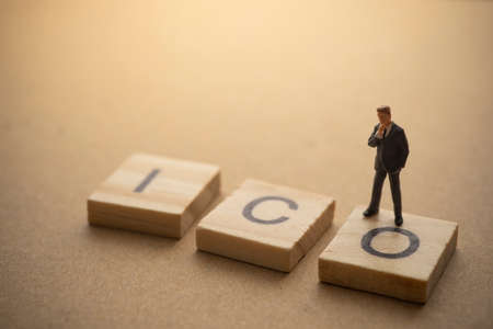 Businessman thinking about invest ICO initial coin offering conceptの写真素材