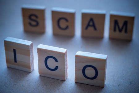 ICO on wood. Initial coin offering conceptの写真素材