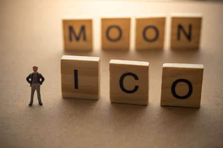 Success businessman with ICO MOON text.の写真素材
