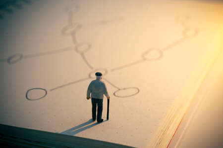 Old man with planning strategy. Old man standing looking on doodle concept of planning.