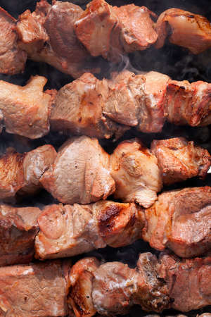 meat kebab from pork cooking on skewers 