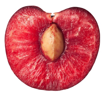 half of ripe, juicy cherry. isolated on whiteの写真素材