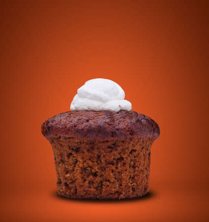 carrot cake-muffin on orangeの写真素材