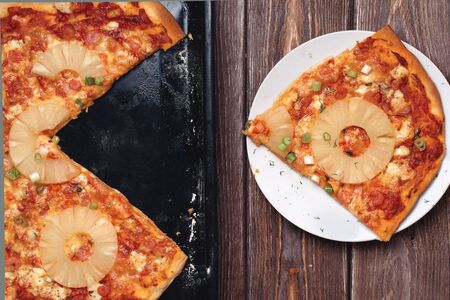 Italian pizza slice on the classic recipe homemadeの写真素材