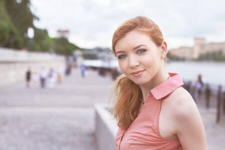 Portrait of a young girl in the cityの写真素材