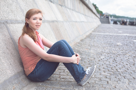 Portrait of a young girl in the cityの写真素材