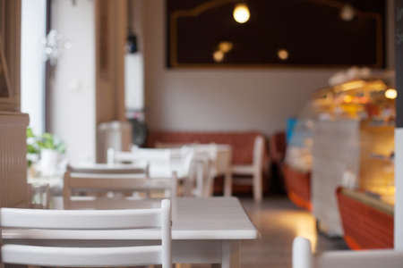 tables and chairs, empty seats in the cafe, light and mild mood of the restの写真素材