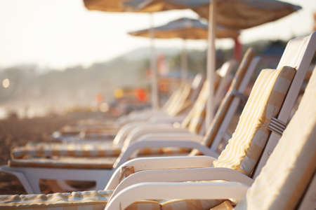 free sun loungers and sunbeds on the beach. bright soft photoの写真素材