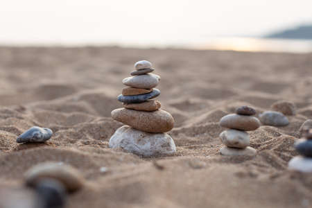 stone sculpture on the beach, beautiful pebble towerの写真素材