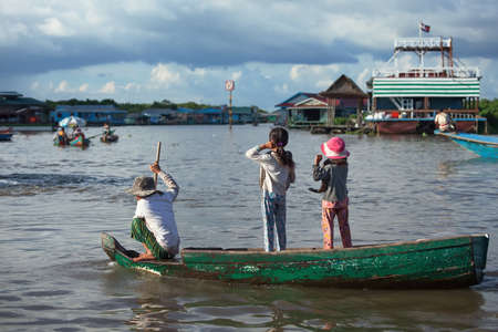 SIEM REAP, CAMBODIA: Cambodian people live on Tonle Sap Lake in Siem Reap, Cambodia on September 25, 2012. This is the largest freshwater lake in SE Asia peaking. Annual flooding of the village.のeditorial素材