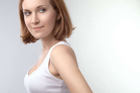 portrait of the beautiful girl, looked back and smiled