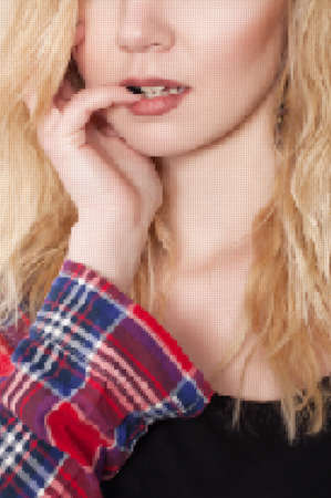 Young beautiful girl posing by the white wall. In shorts and shirt posing against white wall. vector halftoneのイラスト素材