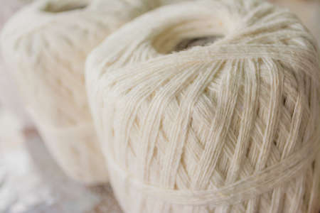 a white string held by Buddhist priestsの写真素材