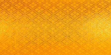 Thai silk gold color background image .の写真素材