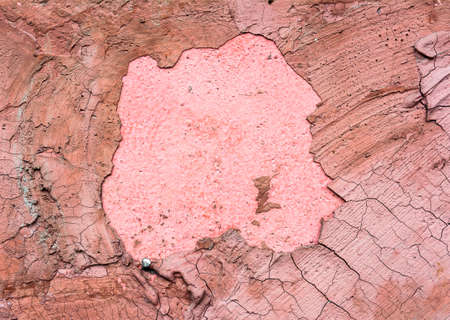 antique Cracked pink concrete wall background imageの写真素材