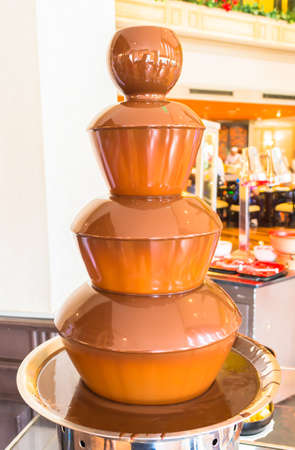 sweet and  hot chocolate fountain in the resturantの写真素材