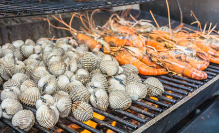 grill freshwater shrimp and shellfish on flame image