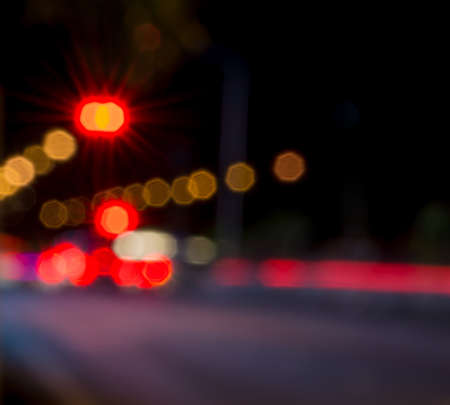 Abstract defocused lights of the night city bokeh background .の写真素材