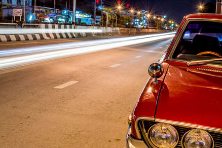 Long exposure photo of light trails on the street in Thailand.の写真素材