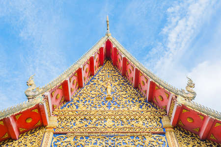 old temple with white cloud and blue sky.