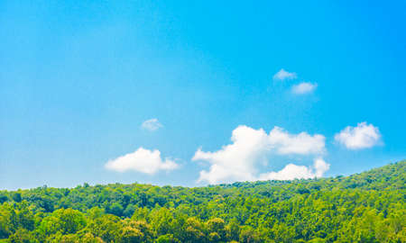image of green hill and  blue sky.の写真素材
