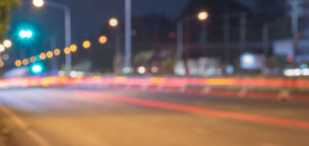 Abstract defocused lights of the night city bokeh background .の写真素材