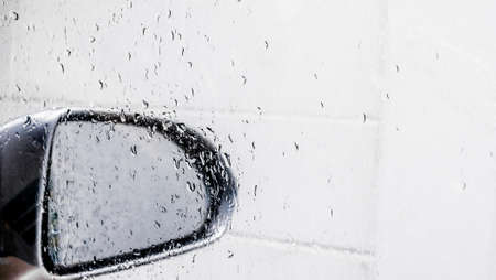 high key image of water drop on glassの写真素材