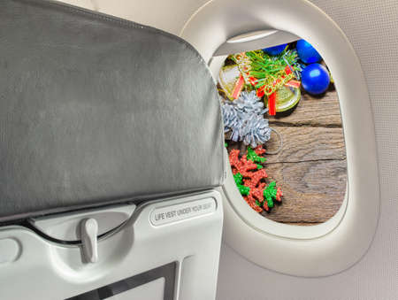 image of  fasten seat belt while seated sign on airplane.の写真素材