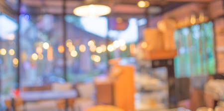 Coffee shop blur background with bokeh image.の写真素材