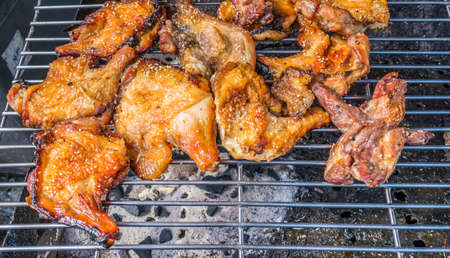 image of Roasted chicken on barbecue grills.の写真素材