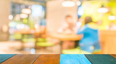 Coffee shop blur background with bokeh image .の写真素材