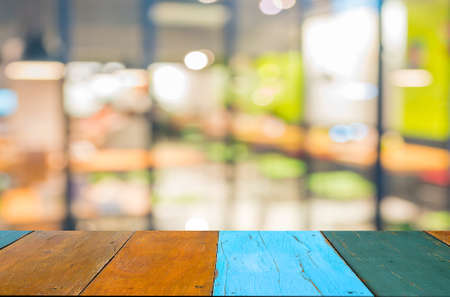 Coffee shop blur background with bokeh image .