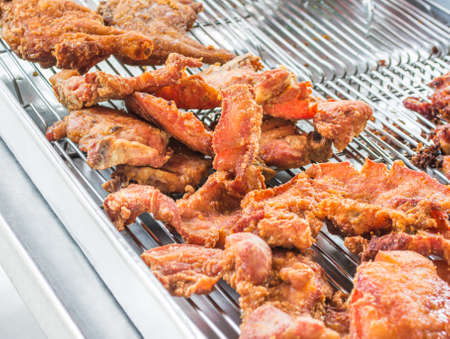image of fried pork on the stainless bar in the market , Chiang Mai ,Thailand.の写真素材