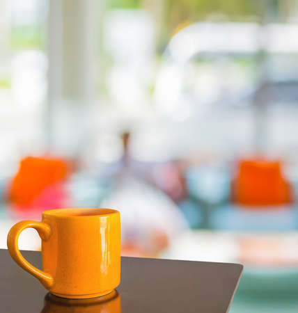 Empty wood table and Coffee shop blur background with bokeh image.の写真素材
