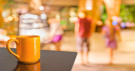 Coffee shop blur background with bokeh image .の写真素材