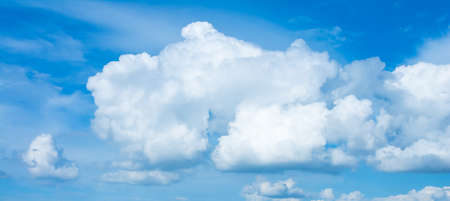 image of clear sky with white clouds on day time for background usage .