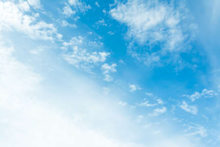image of clear sky with white clouds on day time for background usage .の写真素材
