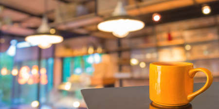 Coffee shop blur background with bokeh image.の写真素材