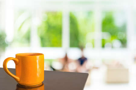 Empty wood table and Coffee shop blur background with bokeh image.の写真素材