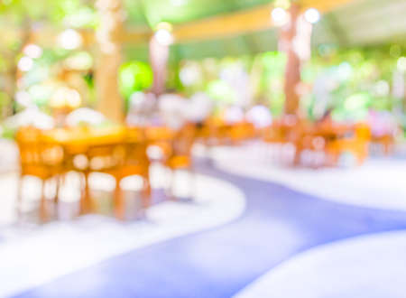 Coffee shop blur background with bokeh image .の写真素材