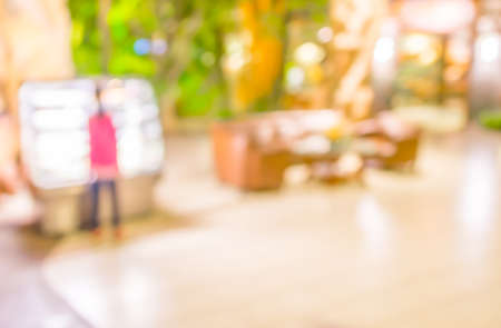 Coffee shop blur background with bokeh image .の写真素材