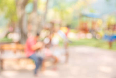Blur background image of people activities in public park with bokeh .の写真素材