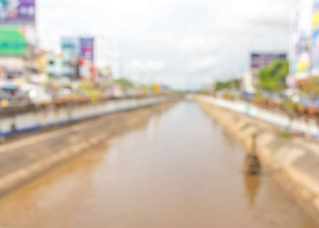 image of brown water with cement  canal in rainy season.の写真素材