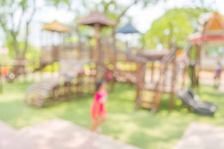 Defocused and blur image of children\'s playground at public park 