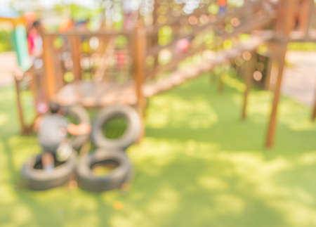 Defocused and blur image of children\'s playground at public park for usage.の写真素材