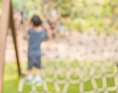 Defocused and blur image of children\'s playground at public park for usage.の写真素材